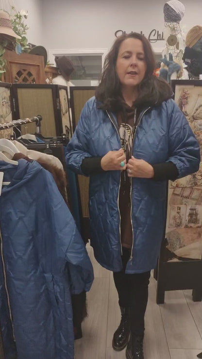 A quilted coat with hood Fits 12-20