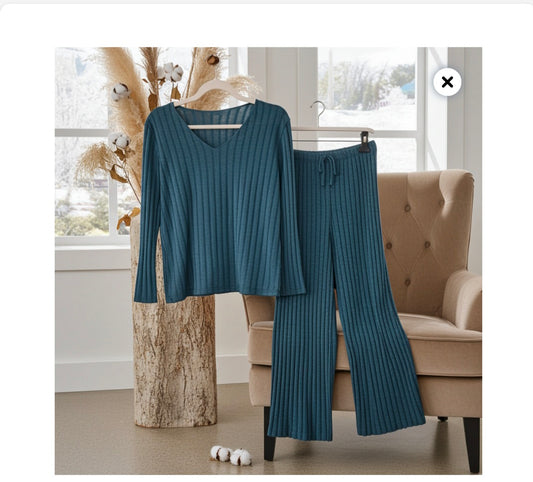 A Two Piece Leisure Suit Fits 10-14
